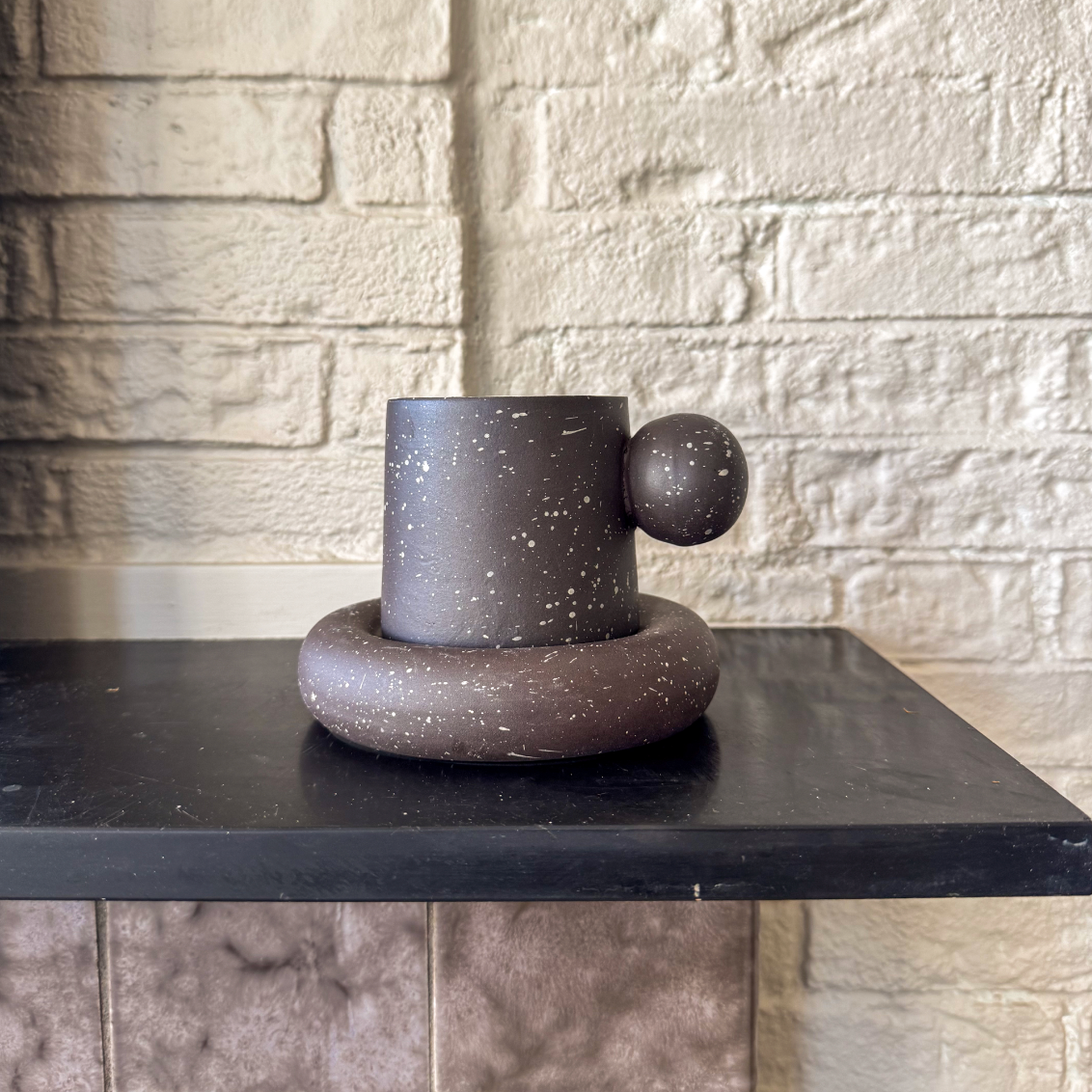 Cup Saucer with sculptural handle