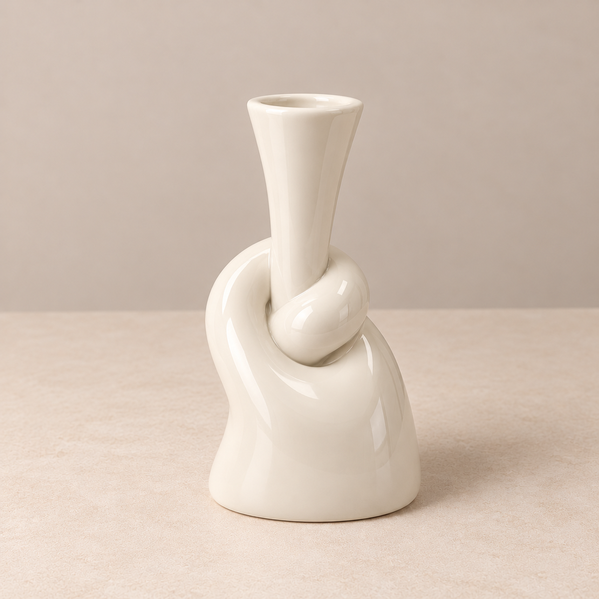 Glossy ivory sculptural ceramic knot bud vase