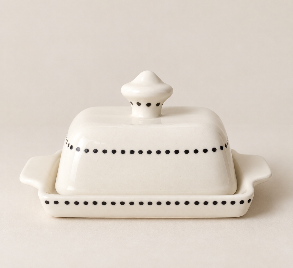 Ivory ceramic butter dish with lid and cocoa brown dots