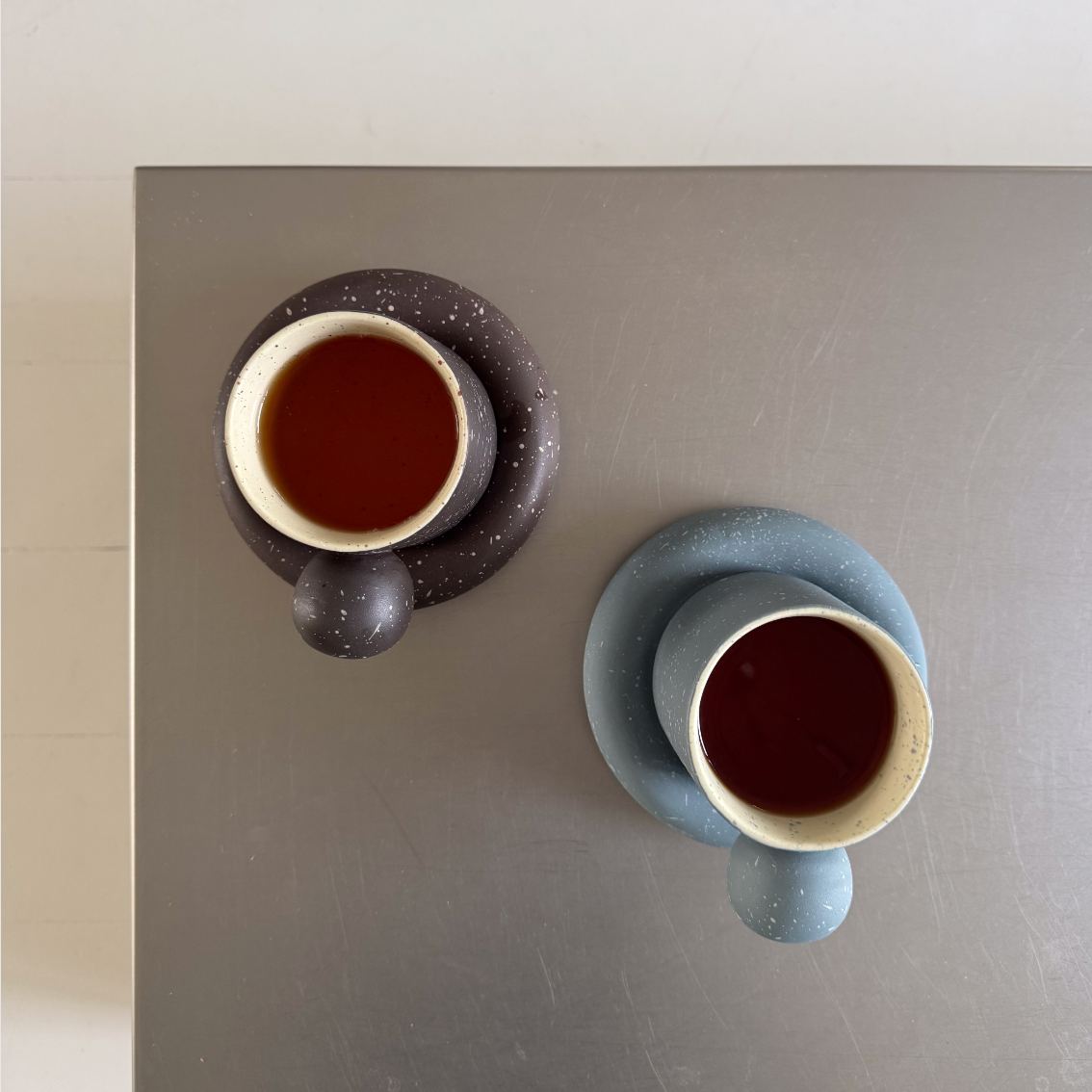 Cup Saucer with sculptural handle